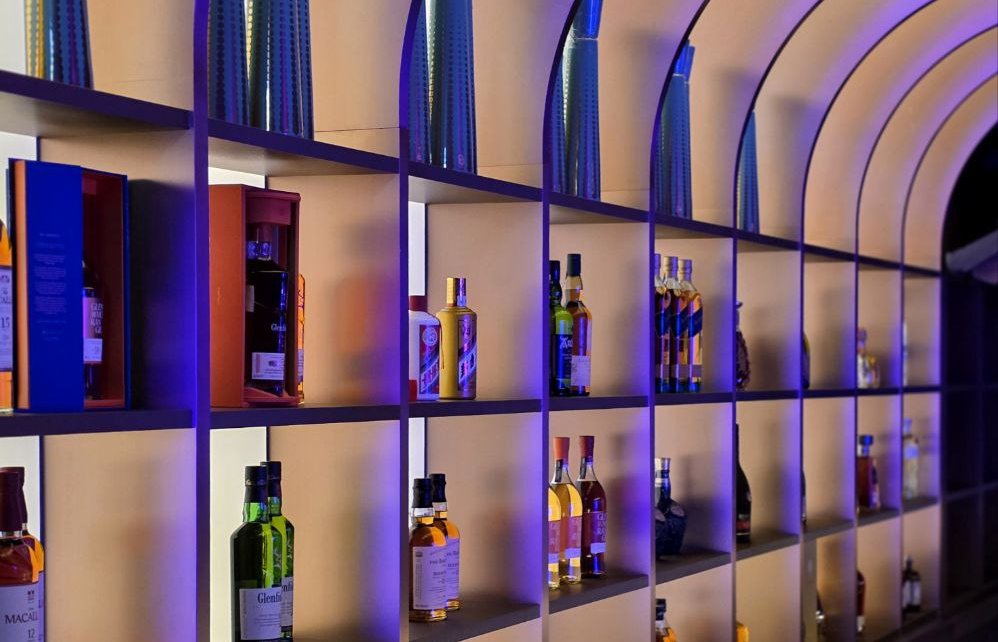 Sapphire Bar’s signature illuminated arch display—where premium spirits meet refined, modern luxury.